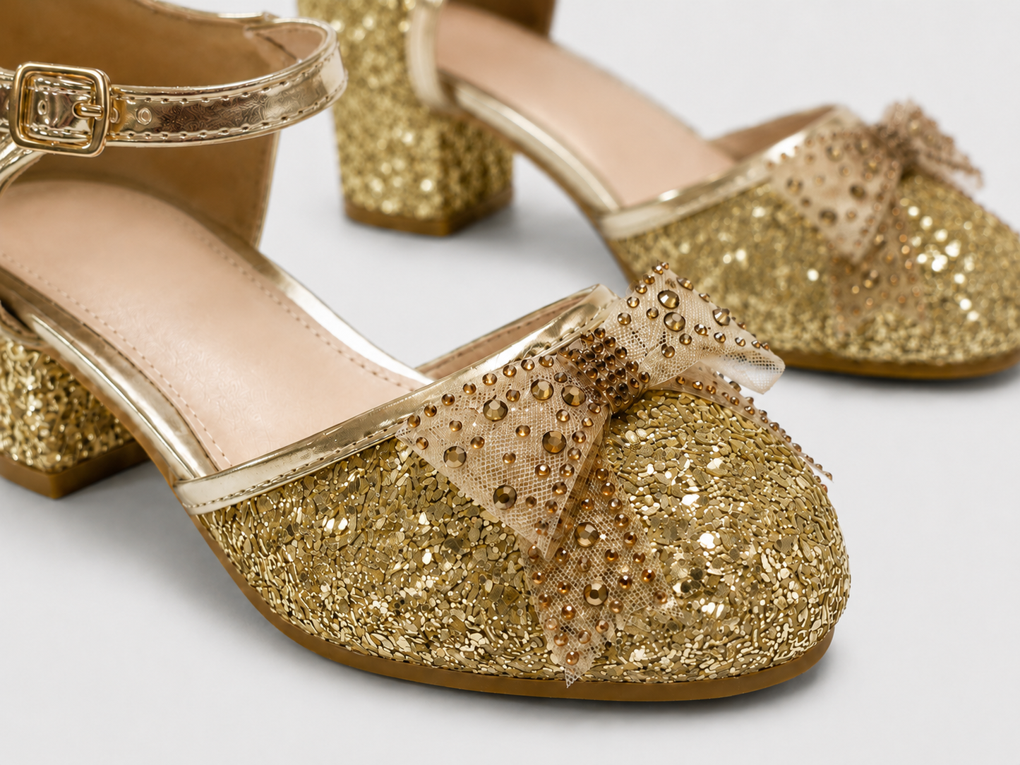close up of gold Bella glitter diamanté bow