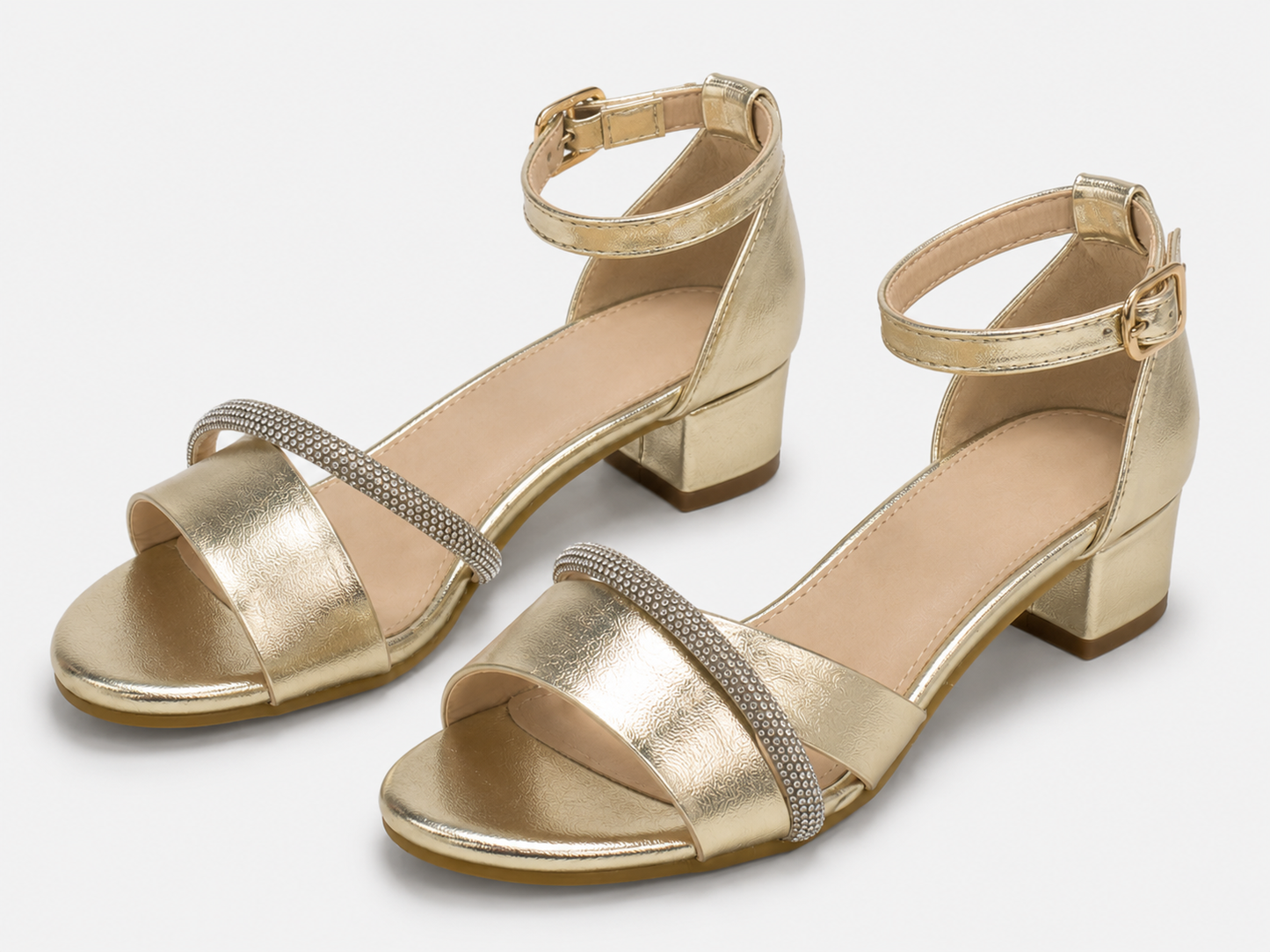 A pair of metallic gold block-heel sandals with a textured silver band across the toes and adjustable ankle straps, shown on a light gray background.